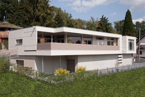Haus mit Sichtbetonkeller und Fundermax Fassadenplatten